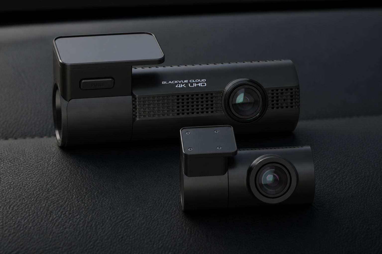 BlackVue ELITE 10 front and rear camera modules in a dark editorial product arrangement.