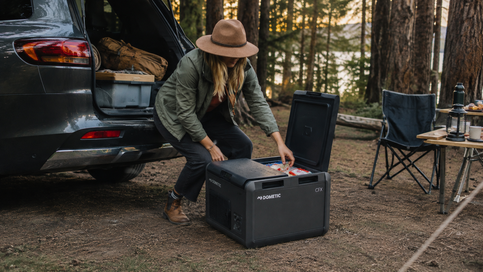 Dometic CFX5 75DZ portable car refrigerator at a campsite