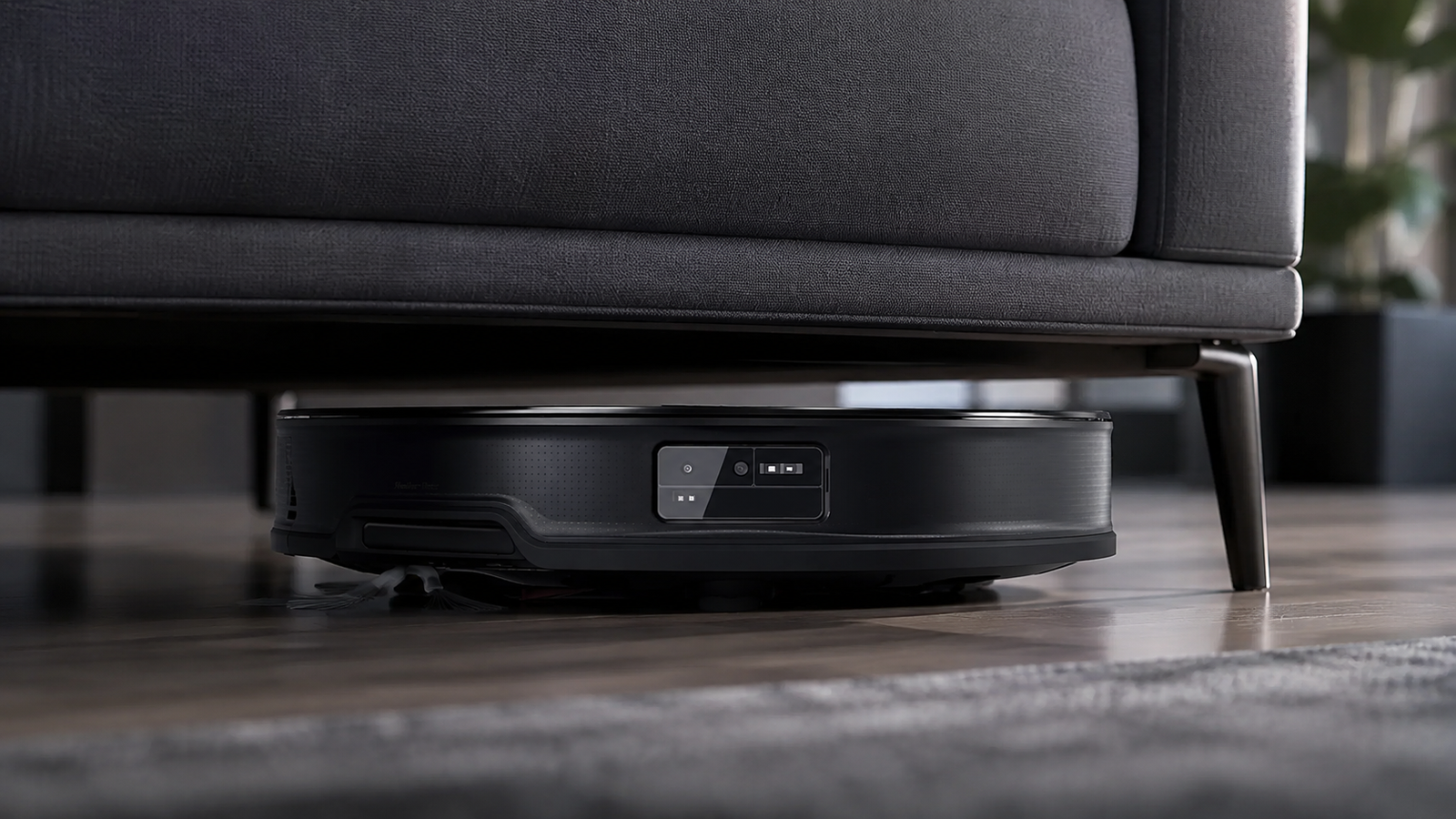 Low-profile Roborock Saros 10R cleaning beneath a sofa