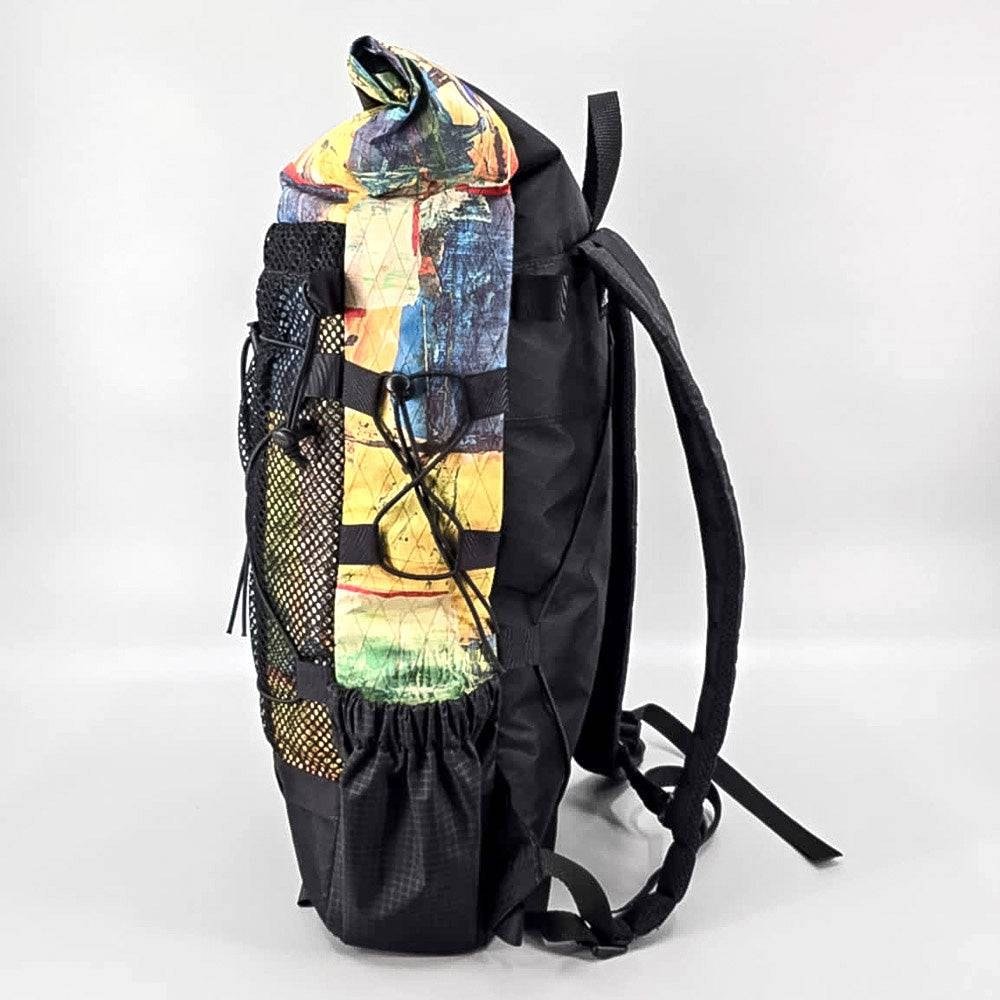 Hilltop Packs 24Seven Trail Backpack Abstract Paint 1 side showing X-Pac grid
