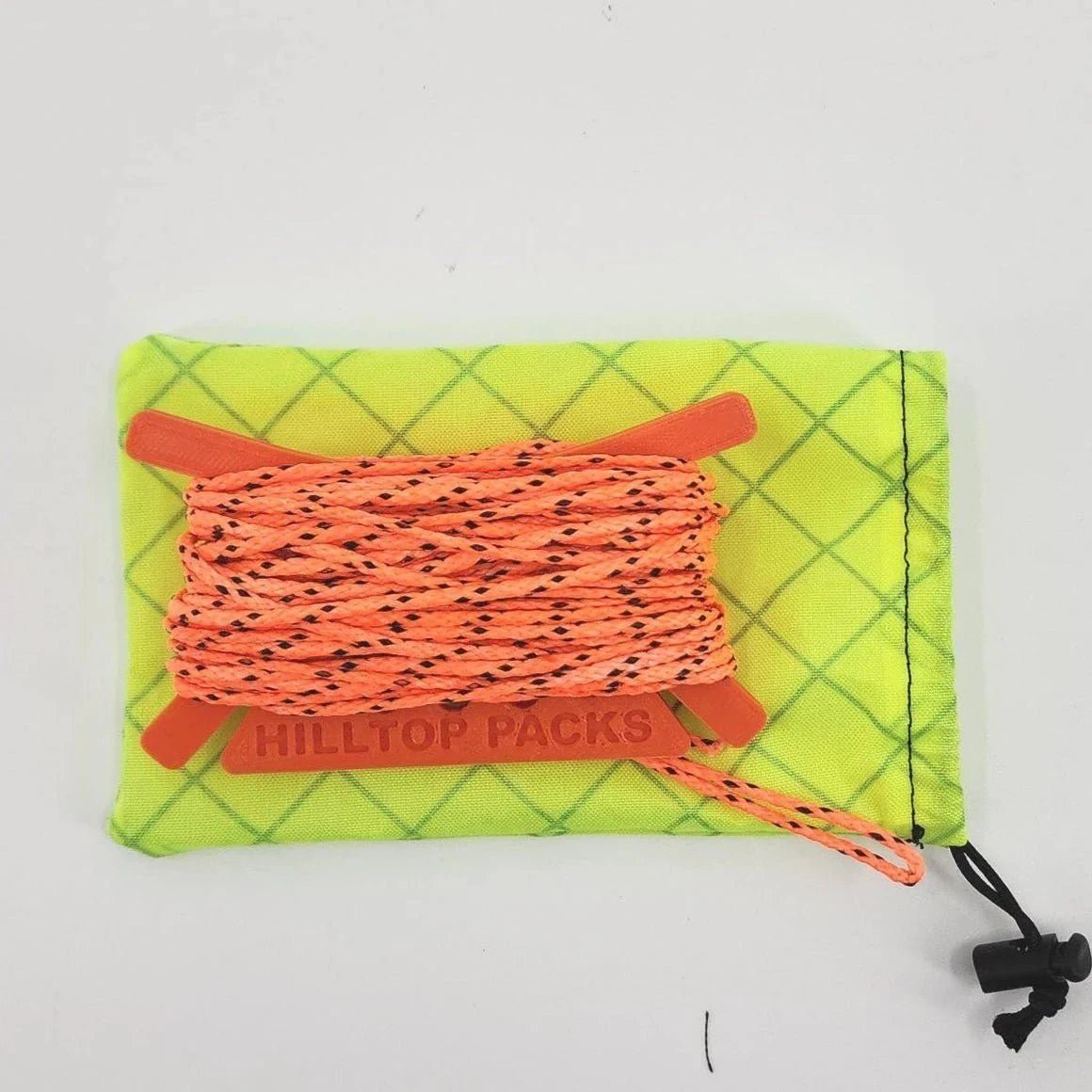 Hilltop Packs bear-bag throw kit showing cord and rock sack