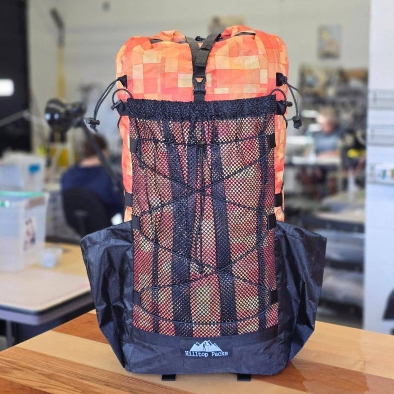 Hilltop Packs Raven ECO V4 printed backpack photographed in the workshop